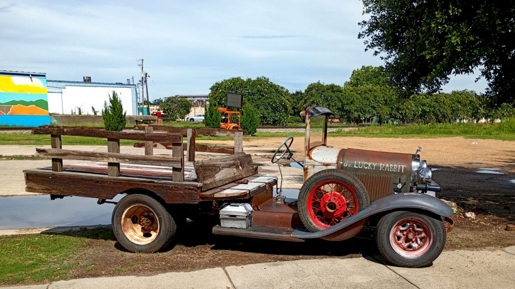 Antique Ford advertising The Lucky Rabbit.